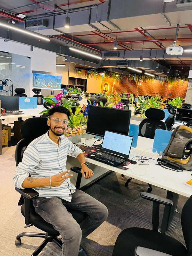 Dev at his desk